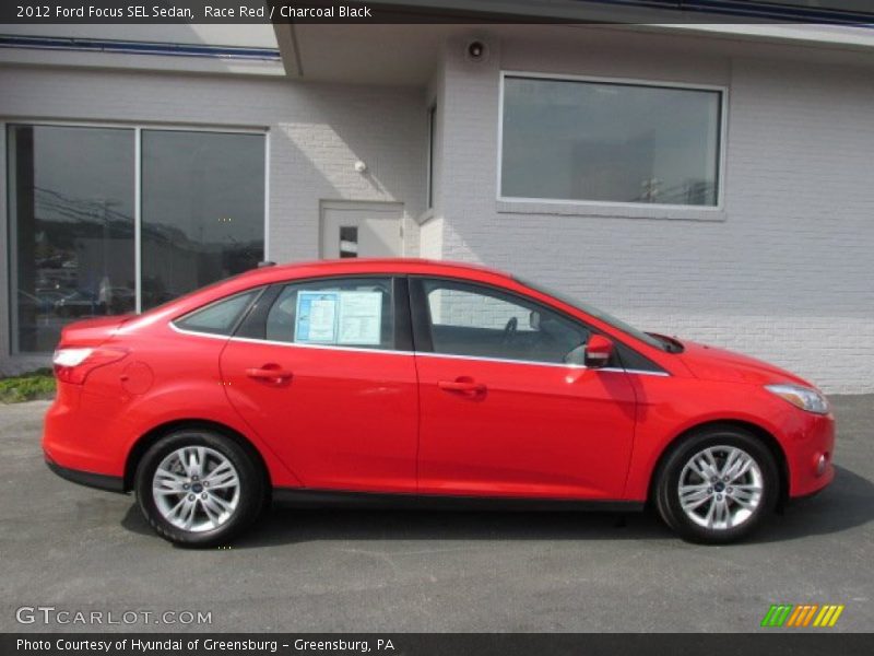 Race Red / Charcoal Black 2012 Ford Focus SEL Sedan