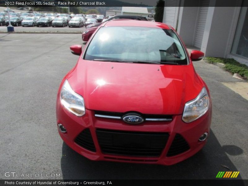 Race Red / Charcoal Black 2012 Ford Focus SEL Sedan