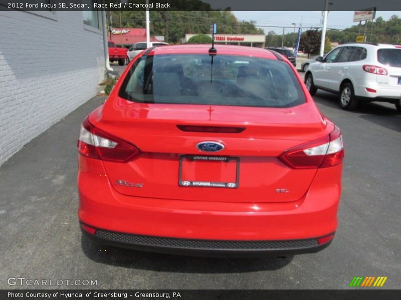 Race Red / Charcoal Black 2012 Ford Focus SEL Sedan