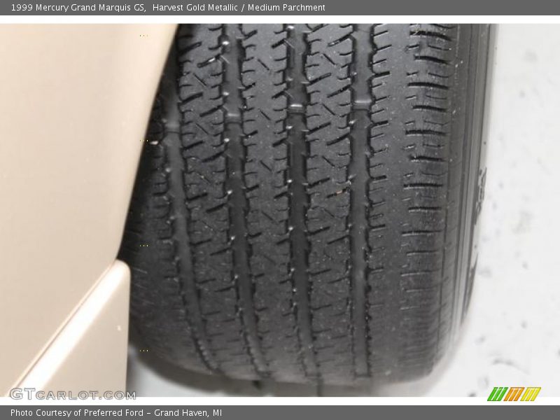 Harvest Gold Metallic / Medium Parchment 1999 Mercury Grand Marquis GS