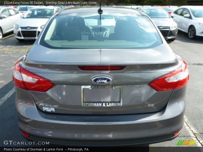 Sterling Gray / Medium Light Stone 2014 Ford Focus SE Sedan
