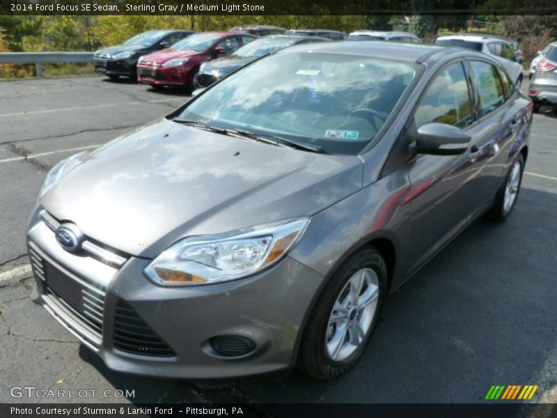 Sterling Gray / Medium Light Stone 2014 Ford Focus SE Sedan