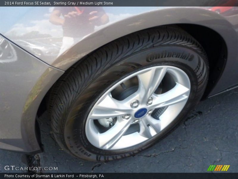Sterling Gray / Medium Light Stone 2014 Ford Focus SE Sedan