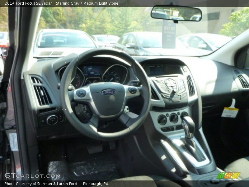 Sterling Gray / Medium Light Stone 2014 Ford Focus SE Sedan