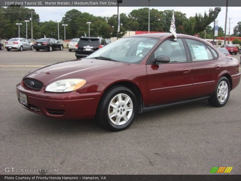 Merlot Metallic / Medium/Dark Flint Grey 2006 Ford Taurus SE