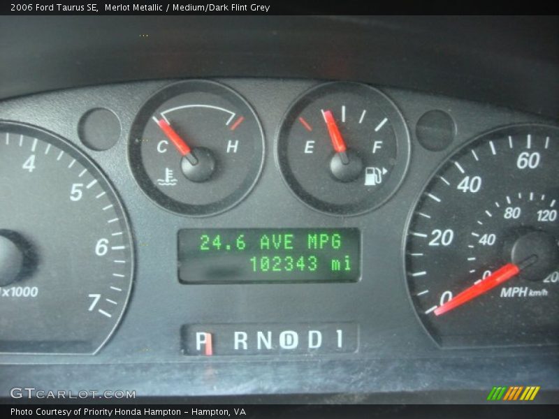 Merlot Metallic / Medium/Dark Flint Grey 2006 Ford Taurus SE