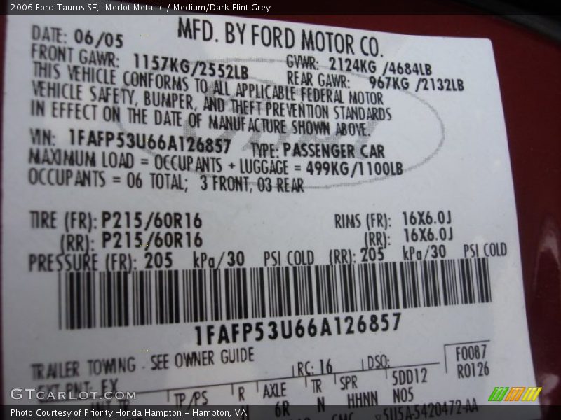 Merlot Metallic / Medium/Dark Flint Grey 2006 Ford Taurus SE