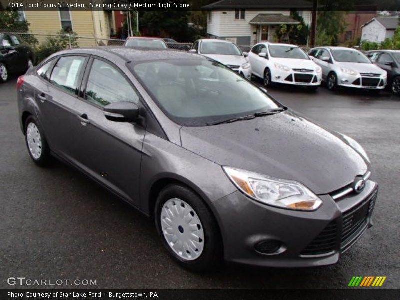 Sterling Gray / Medium Light Stone 2014 Ford Focus SE Sedan
