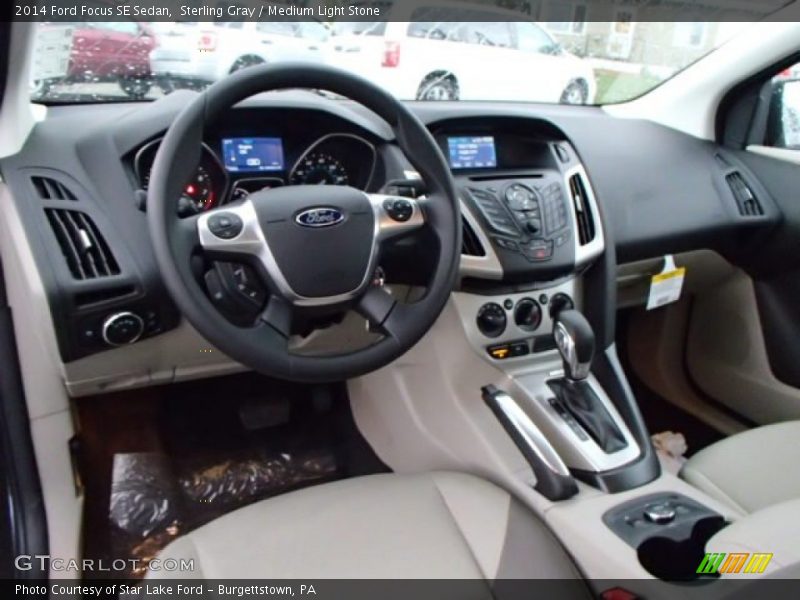 Sterling Gray / Medium Light Stone 2014 Ford Focus SE Sedan