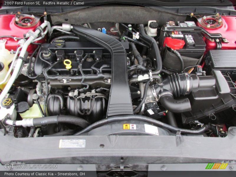Redfire Metallic / Camel 2007 Ford Fusion SE