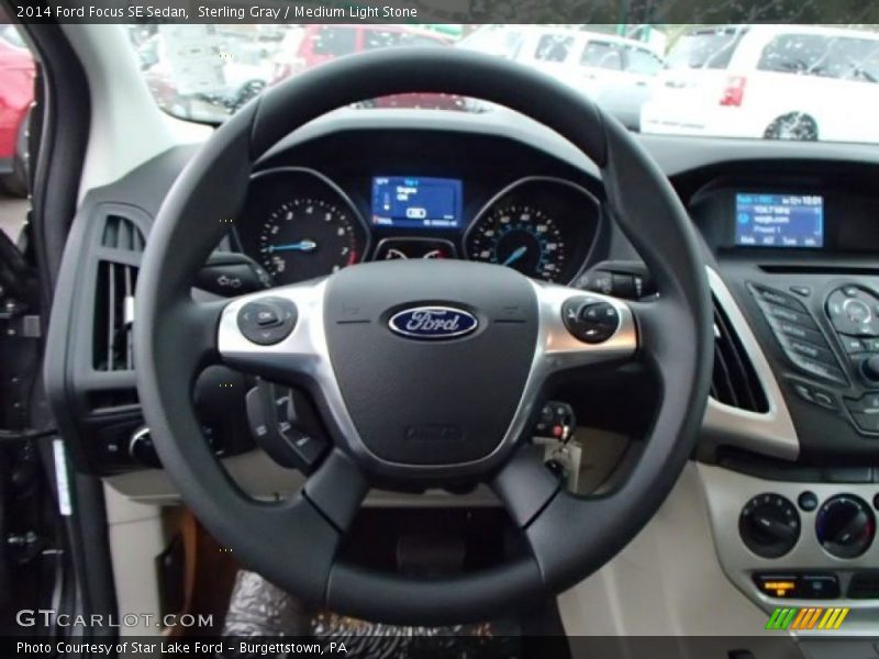 Sterling Gray / Medium Light Stone 2014 Ford Focus SE Sedan