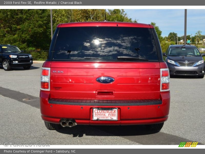 Redfire Metallic / Charcoal Black 2009 Ford Flex SE