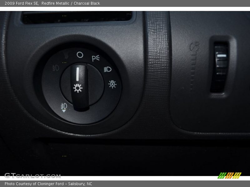 Redfire Metallic / Charcoal Black 2009 Ford Flex SE