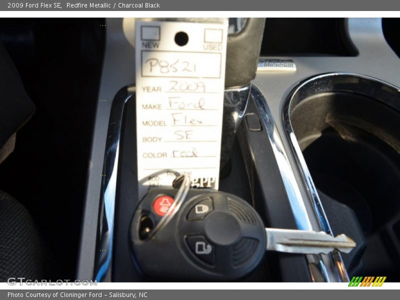 Redfire Metallic / Charcoal Black 2009 Ford Flex SE