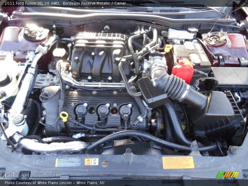 Bordeaux Reserve Metallic / Camel 2011 Ford Fusion SEL V6 AWD