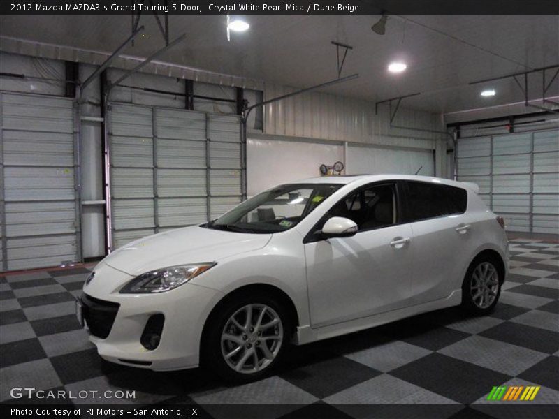 Front 3/4 View of 2012 MAZDA3 s Grand Touring 5 Door