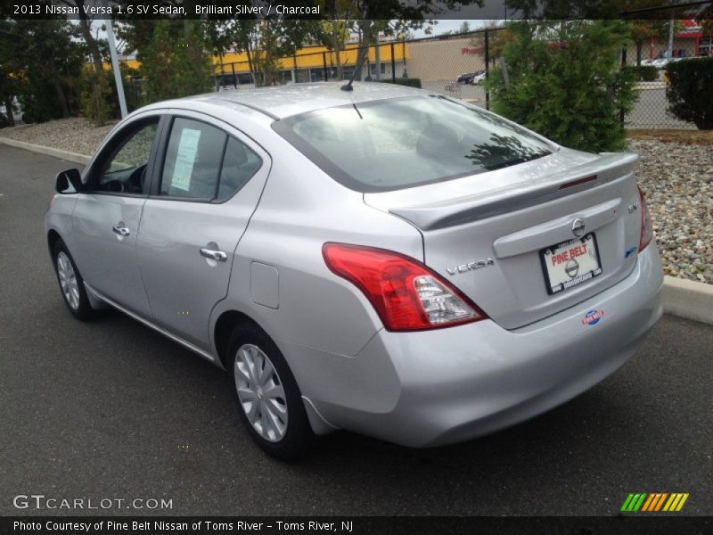Brilliant Silver / Charcoal 2013 Nissan Versa 1.6 SV Sedan