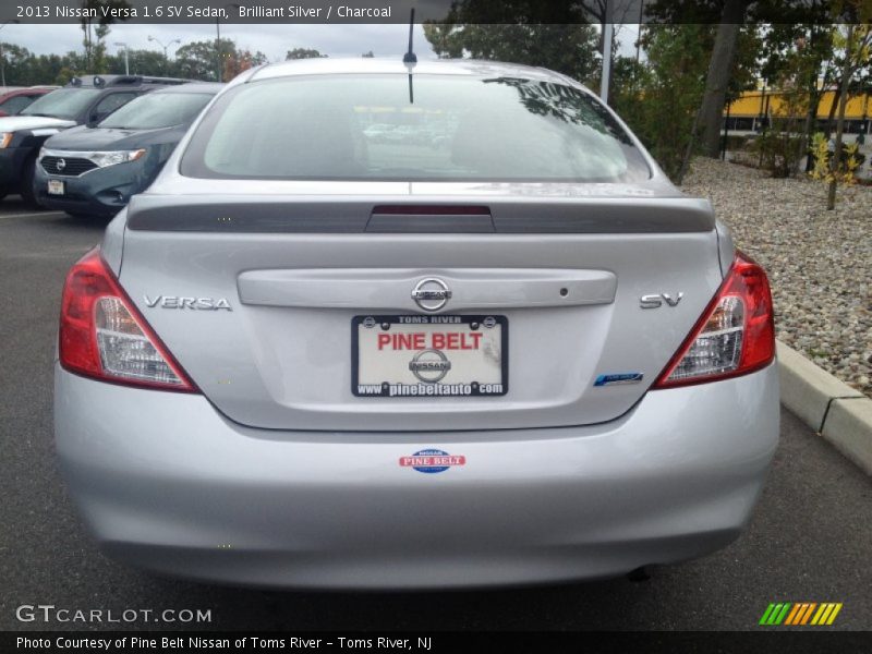 Brilliant Silver / Charcoal 2013 Nissan Versa 1.6 SV Sedan