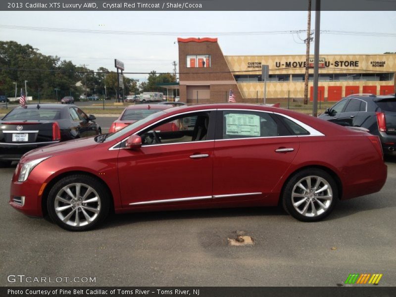 Crystal Red Tintcoat / Shale/Cocoa 2013 Cadillac XTS Luxury AWD