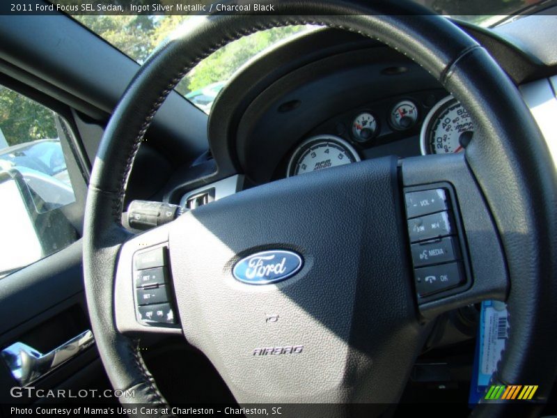 Ingot Silver Metallic / Charcoal Black 2011 Ford Focus SEL Sedan