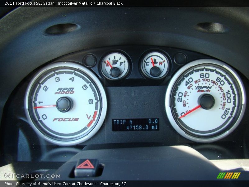 Ingot Silver Metallic / Charcoal Black 2011 Ford Focus SEL Sedan