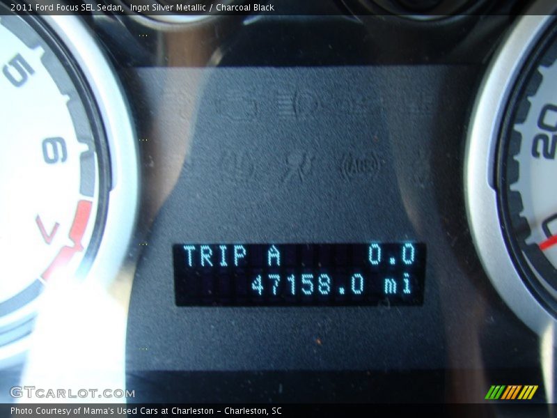 Ingot Silver Metallic / Charcoal Black 2011 Ford Focus SEL Sedan