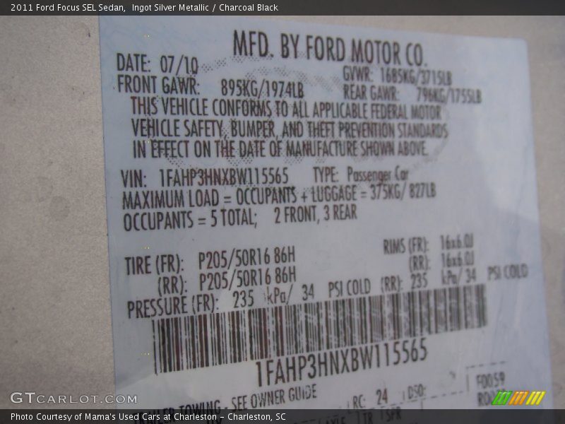 Ingot Silver Metallic / Charcoal Black 2011 Ford Focus SEL Sedan