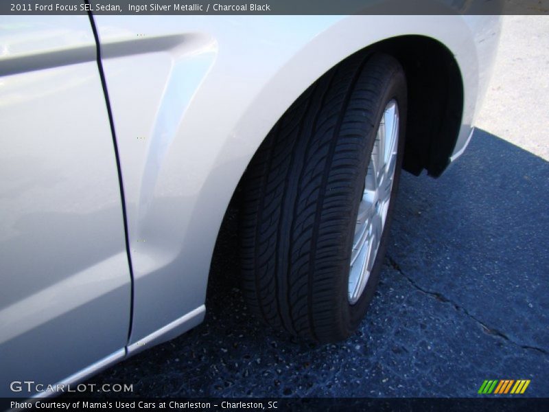 Ingot Silver Metallic / Charcoal Black 2011 Ford Focus SEL Sedan