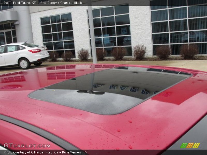 Red Candy / Charcoal Black 2011 Ford Taurus SEL