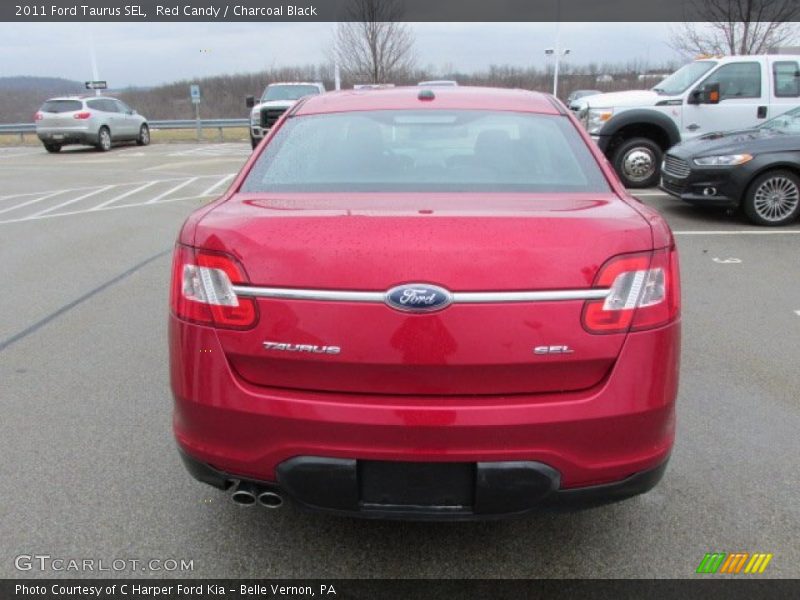 Red Candy / Charcoal Black 2011 Ford Taurus SEL