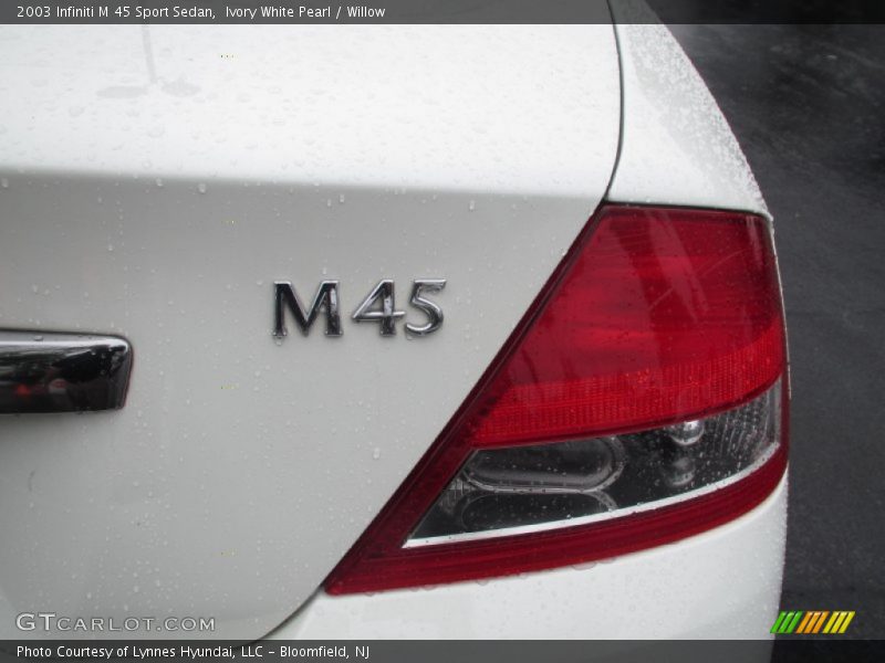 Ivory White Pearl / Willow 2003 Infiniti M 45 Sport Sedan