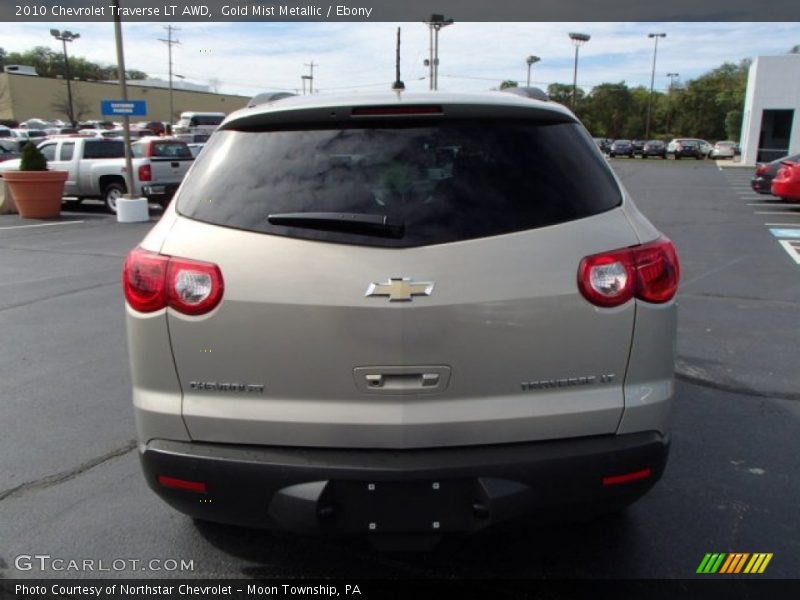 Gold Mist Metallic / Ebony 2010 Chevrolet Traverse LT AWD