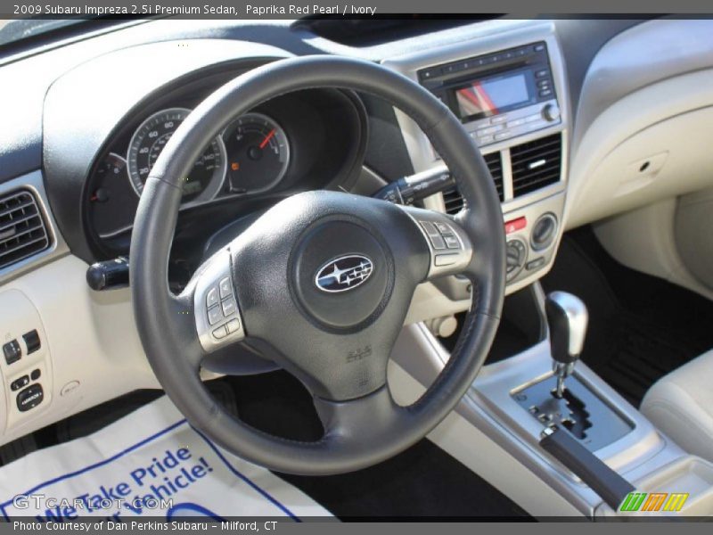 Paprika Red Pearl / Ivory 2009 Subaru Impreza 2.5i Premium Sedan