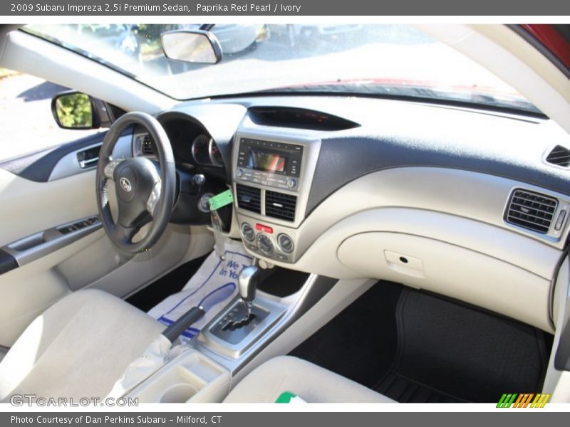 Paprika Red Pearl / Ivory 2009 Subaru Impreza 2.5i Premium Sedan