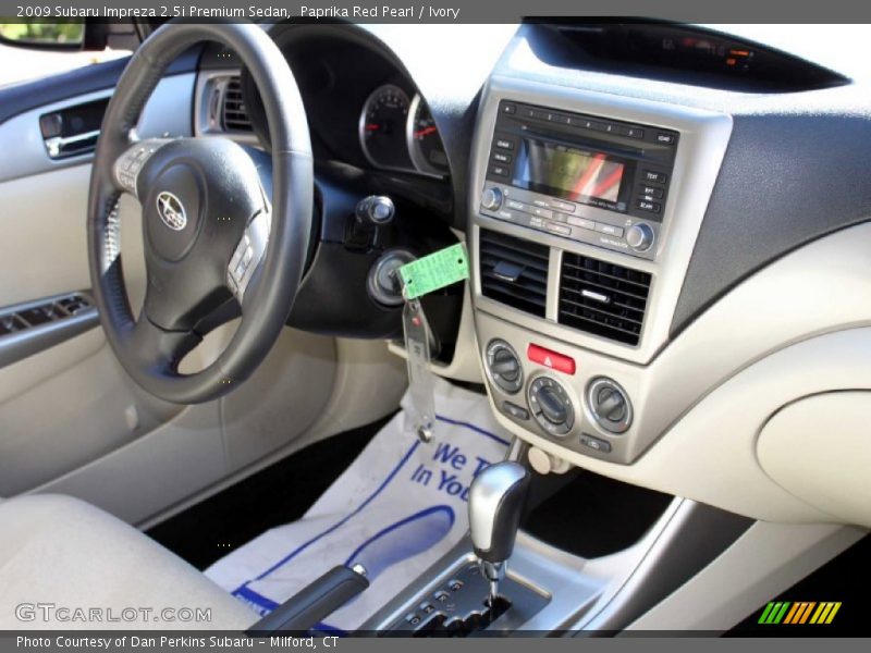 Paprika Red Pearl / Ivory 2009 Subaru Impreza 2.5i Premium Sedan