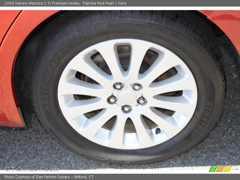 Paprika Red Pearl / Ivory 2009 Subaru Impreza 2.5i Premium Sedan