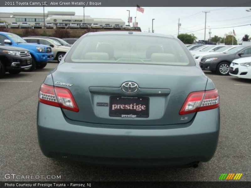 Aloe Green Metallic / Bisque 2011 Toyota Camry LE
