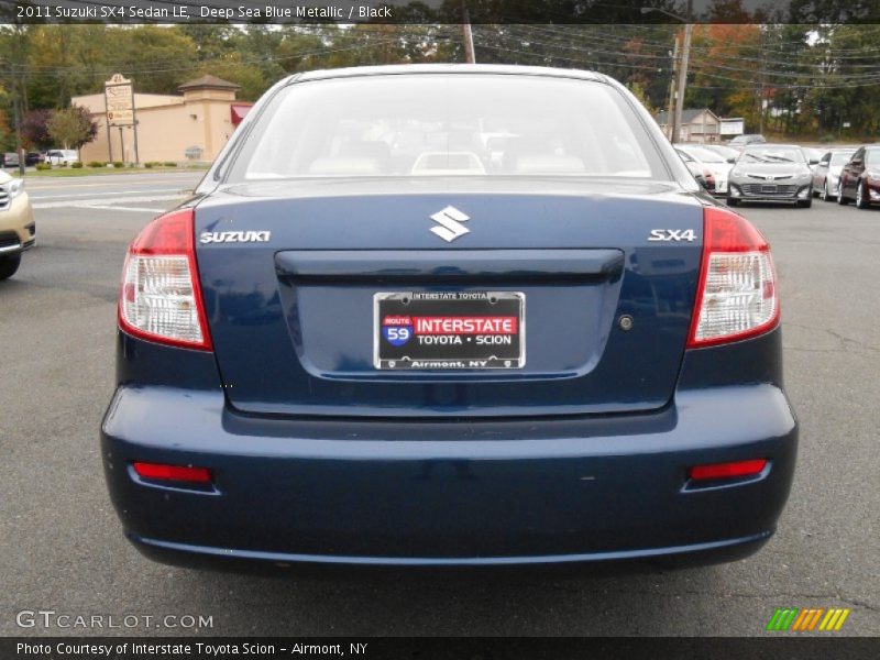 Deep Sea Blue Metallic / Black 2011 Suzuki SX4 Sedan LE