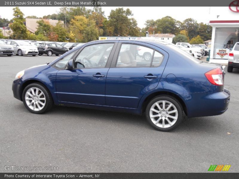 Deep Sea Blue Metallic / Black 2011 Suzuki SX4 Sedan LE