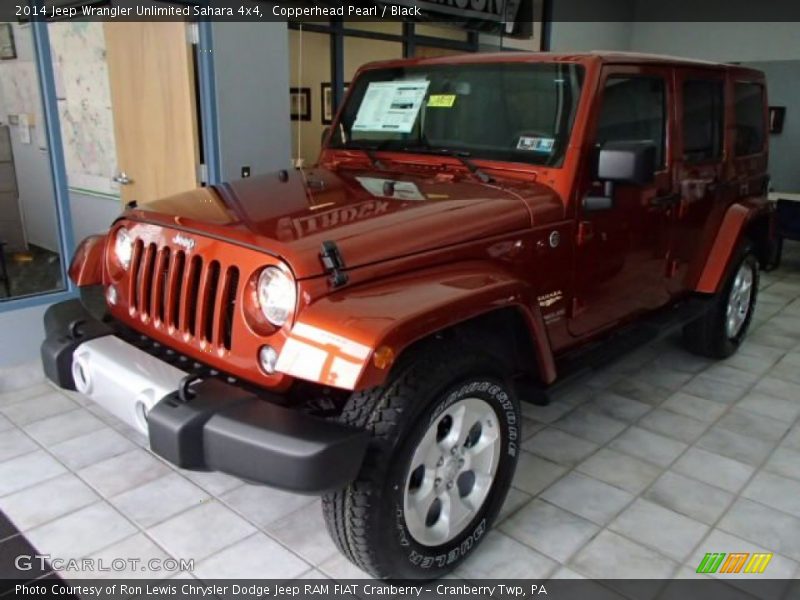 Front 3/4 View of 2014 Wrangler Unlimited Sahara 4x4