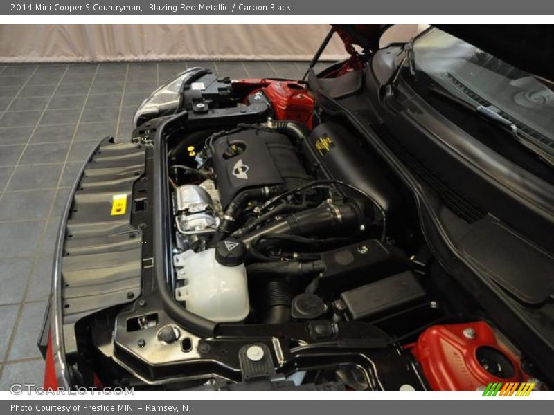 Blazing Red Metallic / Carbon Black 2014 Mini Cooper S Countryman