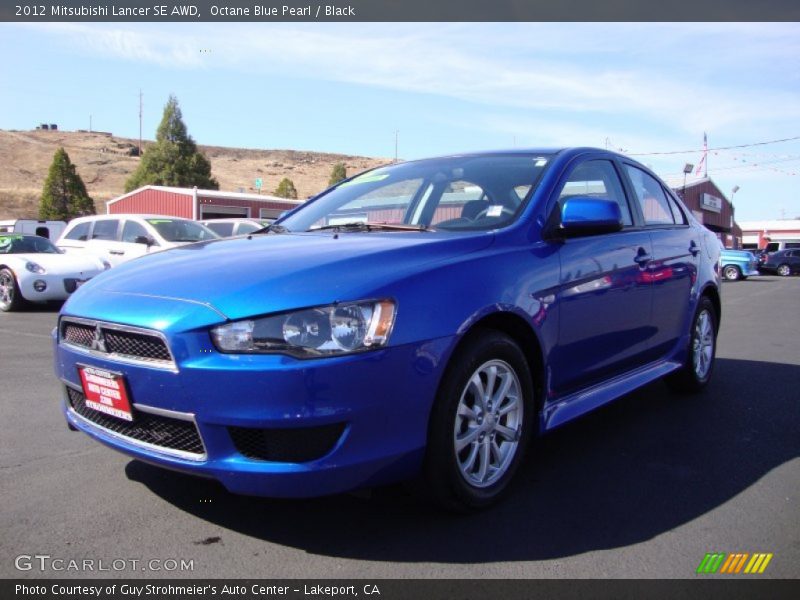 Octane Blue Pearl / Black 2012 Mitsubishi Lancer SE AWD