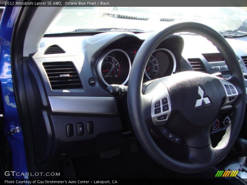 Octane Blue Pearl / Black 2012 Mitsubishi Lancer SE AWD