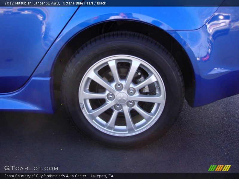 Octane Blue Pearl / Black 2012 Mitsubishi Lancer SE AWD