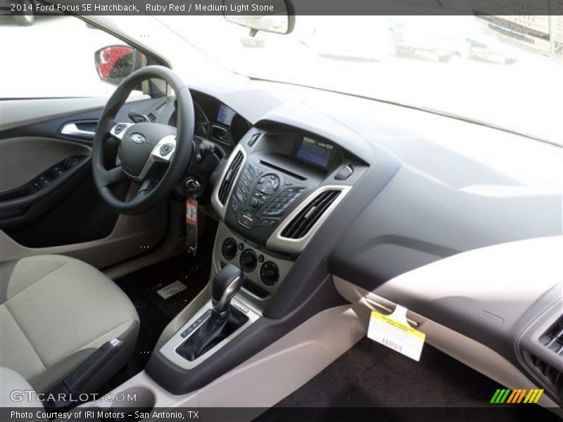 Ruby Red / Medium Light Stone 2014 Ford Focus SE Hatchback