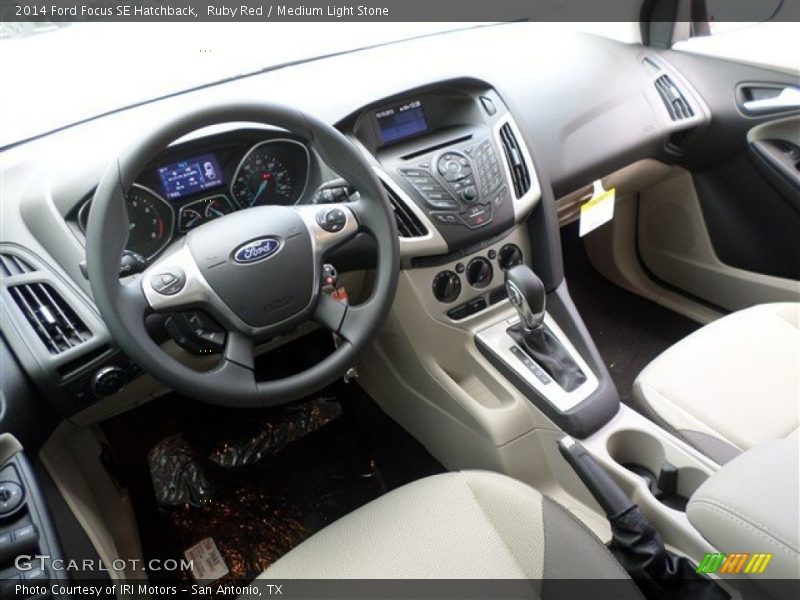 Ruby Red / Medium Light Stone 2014 Ford Focus SE Hatchback
