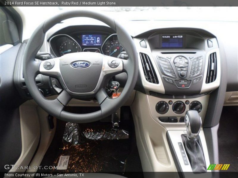 Ruby Red / Medium Light Stone 2014 Ford Focus SE Hatchback