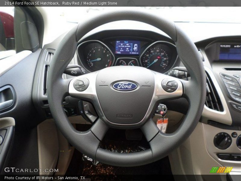 Ruby Red / Medium Light Stone 2014 Ford Focus SE Hatchback