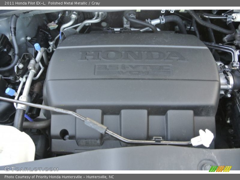 Polished Metal Metallic / Gray 2011 Honda Pilot EX-L