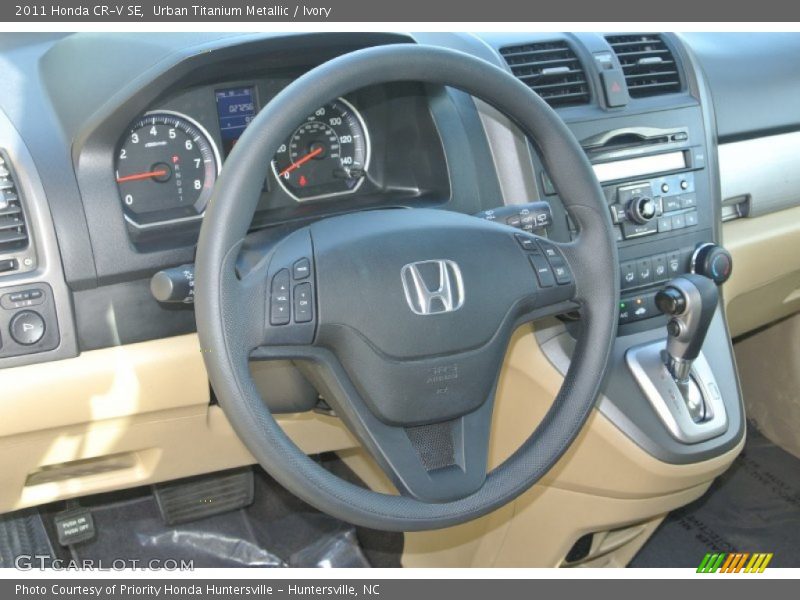 Urban Titanium Metallic / Ivory 2011 Honda CR-V SE